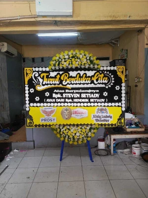 Papan Bunga di Stasiun Manggarai