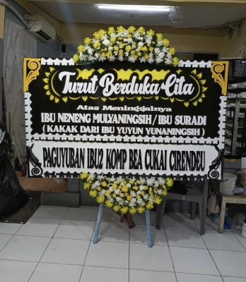 Papan Bunga di Stasiun Manggarai