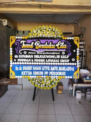 Papan Bunga di Stasiun Manggarai